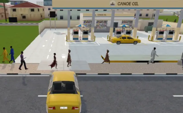 A yellow saloon turning off Freedom Way into a filling station, pump islands under the canopy, in the game